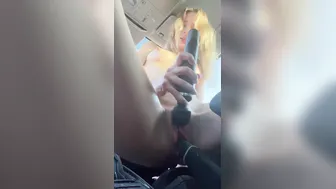 German blonde EvieEvans1 begs for a car handbreak while pleasuring herself in public