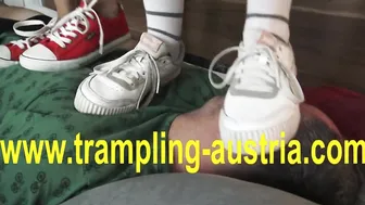 Watch these kinky goddesses dominate and smell their slaves' feet in sneakers