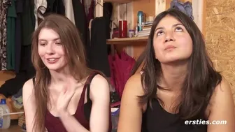 Watch these two hot babes go wild with strap-on dildos and reverse cowgirl action